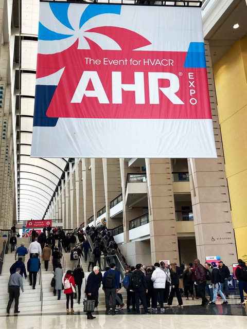 AHR Expo banner over the entrance hall, with visitors heading into the show