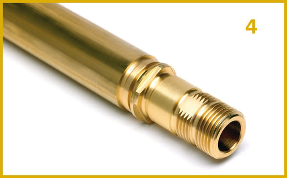 Fourth stage. Precision turning process: polygon turning and drilling on a brass mechanical component.